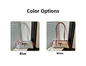 Sacs baguette à pois bleus et blancs avec des nœuds rouges et des pendentifs en cœur