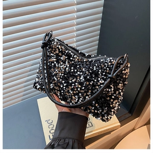 Detail of high-density black sequins on a fashion handbag with rope handle and knots