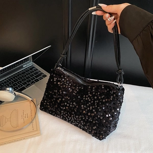 Sparkly black sequin crossbody bag with chain strap and elegant knot detail for summer