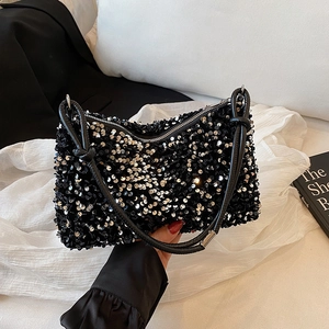 Sparkly black sequin crossbody bag with chain strap and leather handle for women