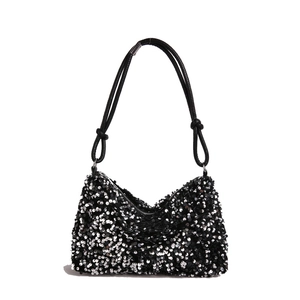 Chic black sequin handbag with silver metallic rings and rope handle for summer fashion