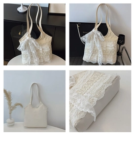 Close-up view of delicate lace ruffles and a large ribbon bow on a beige bucket bag