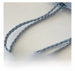 Close-up of light blue tote bag featuring premium woven PU leather handles and fine texture