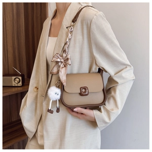 Khaki crossbody bag with brown buckle, striped silk scarf bow, and cute plush charm pendant
