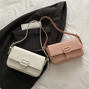 Minimalist faux leather baguette bags in off-white and dusty rose with elegant square buckle