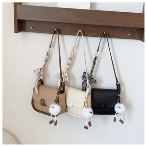 French style crossbody bags in khaki and cream with silk scarf handle and plush pendant