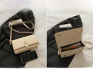 Detail view of cream crossbody bag featuring knit texture and interior storage capacity