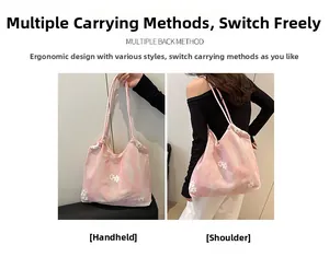 Detail of pink cloud-pattern tote bag with 3D floral embroidery and sturdy handles