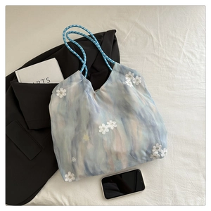 Artistic light blue tote bag with 3D white lace flowers and braided rope handles