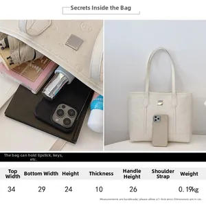 Detailed size chart and capacity overview of the white heart-embossed tote bag