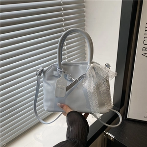 Sac à main bleu clair rétro avec nœud en dentelle et poignée supérieure élégante