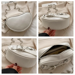 Detailed views of a white crescent shoulder bag featuring silver chain and metal buckle