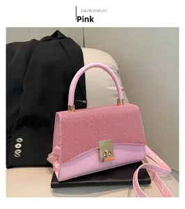 Pink Boston bag with textured red and white pattern flap and gold metal lock detail
