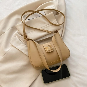 Minimalist French retro crescent underarm bag in khaki with gold pyramid buckle hardware