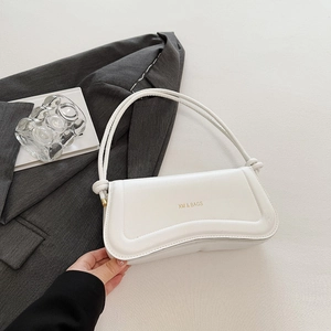 Chic white faux leather shoulder bag for women with gold logo and curved flap design