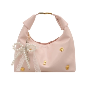 Pink matte leather dumpling bag with cat paw metal trim and pearl bow charm