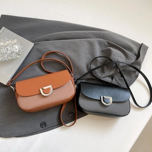 Retro shoulder bags in brown and black woven texture with silver horseshoe metal buckles