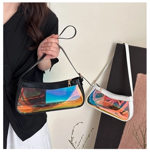 Close-up of black and white holographic jelly shoulder bags with metallic chain strap