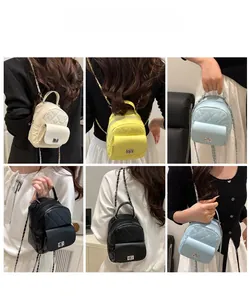 Detailed views of mini quilted backpacks showing white, yellow, blue, and black colors