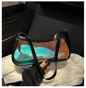 Close-up of holographic transparent PVC shoulder bag with black leather trim and metal zipper