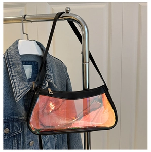 Detailed view of the iridescent jelly bag with black trim and golden metal zipper