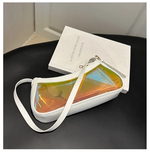 Close-up of minimalist white shoulder bag with holographic transparent PVC panel