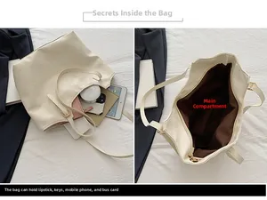 Dettaglio dell'interno di una capiente borsa tote panna con spazio per tablet e trucchi