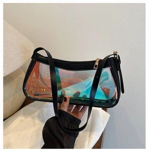 Detailed view of iridescent laser bag with black leather frame and metal zipper