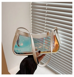 Close-up of holographic jelly shoulder bag with white faux leather trim and metallic zipper