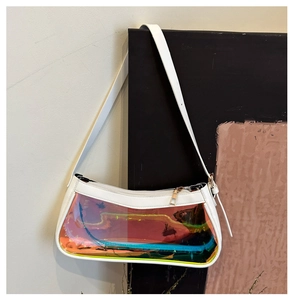 Detail view of large summer shoulder bag with iridescent PVC panel and white leather trim