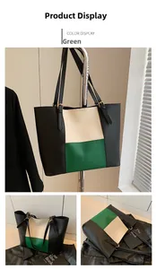 Detail of tricolor large tote bag with textured faux leather and golden hardware