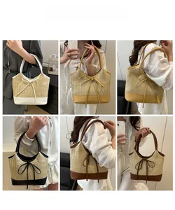Detail der Stroh-Schultertasche mit Schleife und bunten Lederapplikationen im Set
