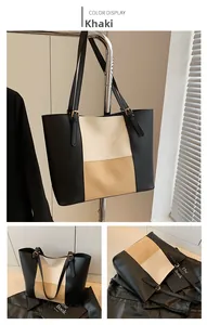 Detailed view of the khaki tri-color patchwork leather tote bag with adjustable strap
