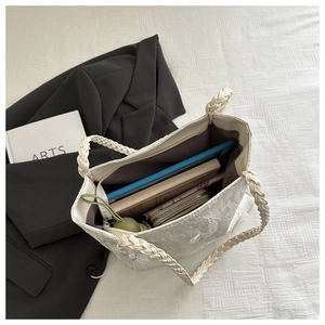 Lace tote bag interior view showing large capacity for tablet, wallet and notebooks