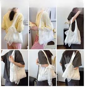 Multiple views of a white lace tote bag with a decorative bow in an indoor setting