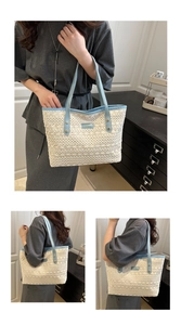 Detailed view of beige woven tote bag with light blue leather trim and brand logo tag