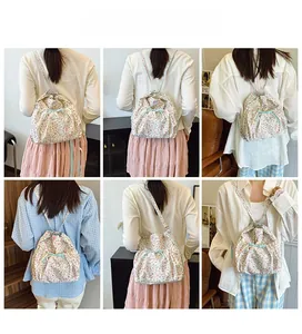 Detailed views of floral drawstring backpack showing multi-angle model carry and straps