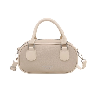 Retro beige leather bowling bag with top handles and adjustable shoulder strap