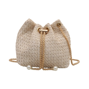 Fashionable woven bucket bag with gold chain drawstring and pearl accents for women