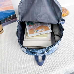 Blue graffiti canvas backpack with large capacity and multi-layer storage compartments