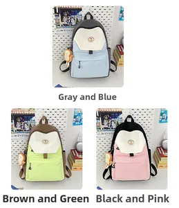 Three color variants of nylon school backpacks with contrast splicing and plush pendants