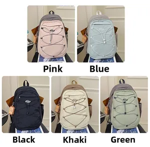 Vue matricielle de sacs à dos en nylon en rose bleu noir kaki et vert avec cordons