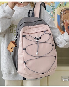 Sac à dos en nylon rose et gris avec cordons élastiques et breloque toast mignonne
