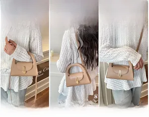 Detailansicht der beigen Ledertasche mit goldenem Schildschloss und Tragevarianten
