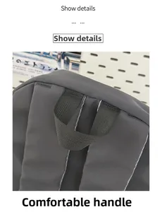 Detail of comfortable thickened woven top handle on a gray minimalist school backpack
