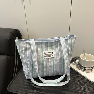 Striped canvas shoulder tote bag with colorful pleated design and large capacity