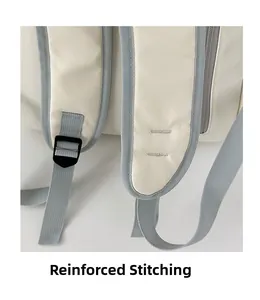 Detail of reinforced bartack stitching on the shoulder strap for enhanced durability