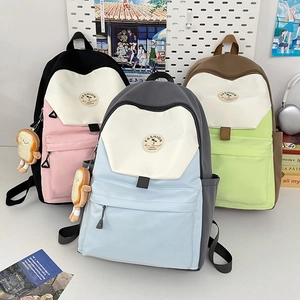 Youthful color-block nylon backpack for college students with a cute toast plush pendant