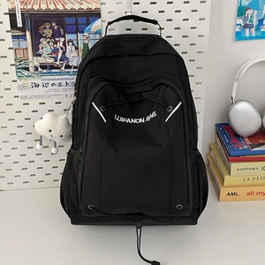 Large capacity black nylon backpack for students with cloud pendant and white accents