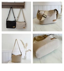 Detail view of black and beige minimalist crossbody bags with adjustable straps